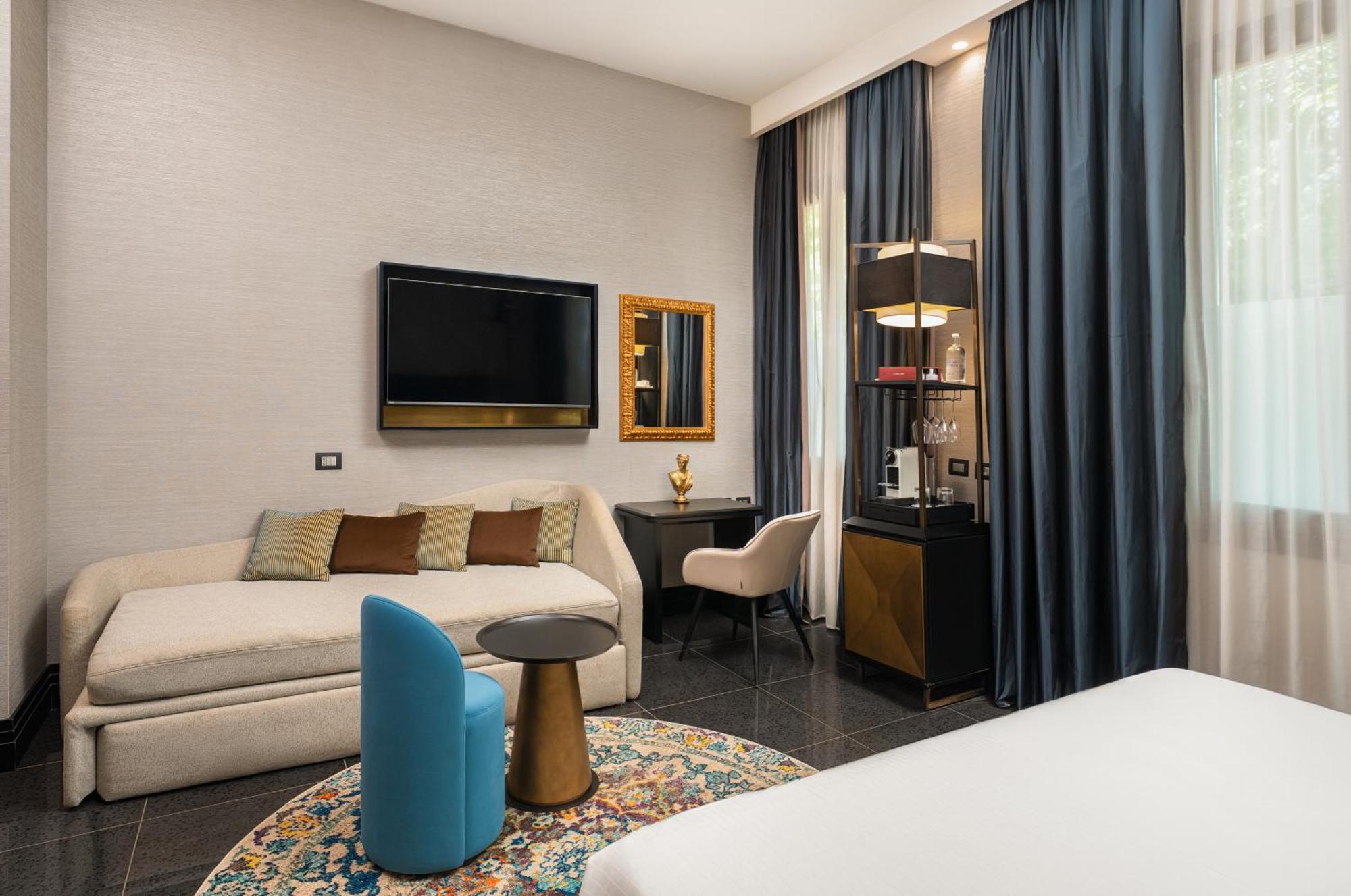 Premium Kamer met Queensize Bed en Slaapbank